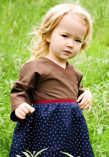 We are a new online children's clothing boutique featuring only eco-friendly fabric and sustainable clothing production