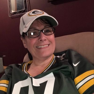 Wife, mother, Walleye Hockey & Packers fan, scrapbooker and fairy & dragon garden extraordinaire.