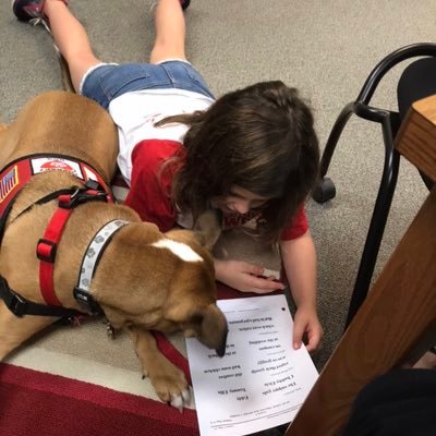 I’m a certified therapy dog who loves to be read to! Humanitarian Health Animals