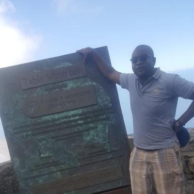 Development Finance Professional. African. Believer