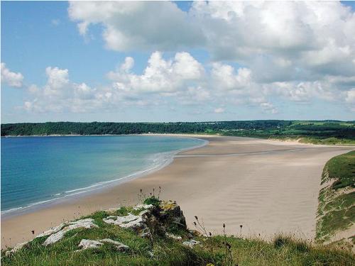 Family camping park in the heart of Britain's first Designated Area of Outstanding Natural Beauty, that is the Gower Peninsula.