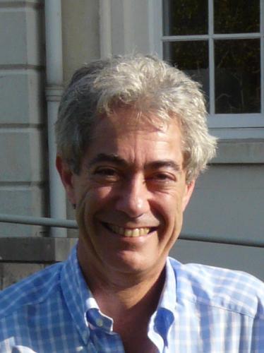 Seeks inferences from data, logic and preconceptions. Pompous and pedantic a-dogmatist. Smiles a lot and owns his own hair.