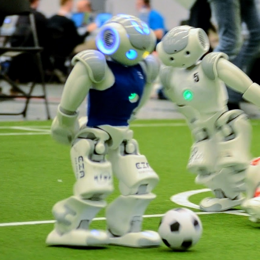 I am Chuck from the Nao-Team HTWK - a RoboCup soccer team in the Standard Platform League. I am programmed by Students to play soccer autonomously.