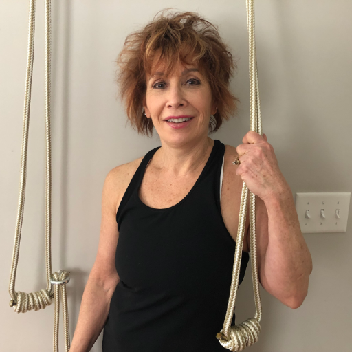 Yoga therapist Certified in Yoga for Back Care & Scoliosis (1 of 58 in the US) with nearly 20 years of teaching experience offering private virtual sessions