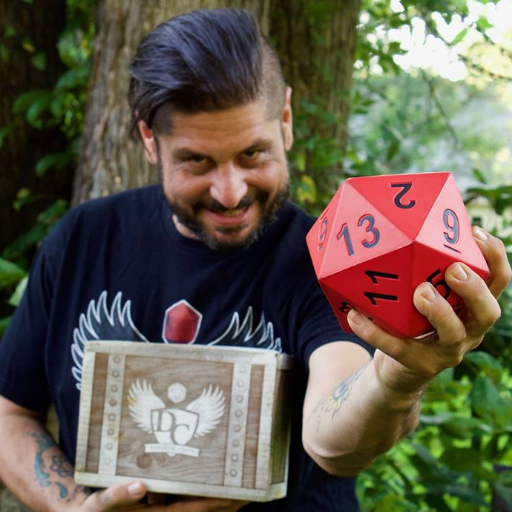 Owner of Dungeon Crate/Lords of Adventure and Wargames, artist, crafter, drummer, podcaster, longsword fencer. cats and dragons are my jam. I believe in magic.