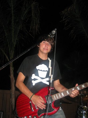 im in a relationship with a girl named Emily :)and in a band called Public Xo's