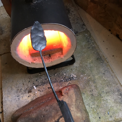 Slowly learning to hit hot metal with a hammer in west Wales