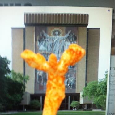 mikeyherman's profile picture. I have a Cheeto in the shape of Touchdown Jesus!