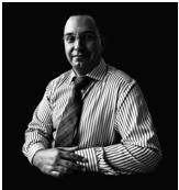 Chartered Surveyor, huge F1 & cricket fan, school governor