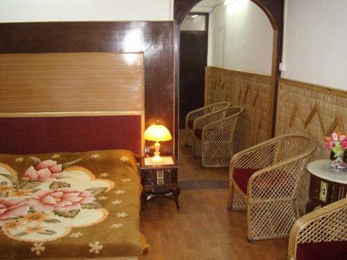 Popular centrally located hotel with a view of the naini lake and hills.