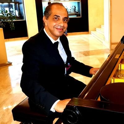 Solo piano, Pianist. Oriental music. Piano teacher. Piano accompaniment. Piano music arranger. Medical doctor (pediatrician). Egypt. Alexandria