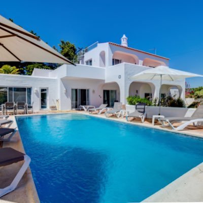 Algarve Portugal Villa - 5 bedroom/4.5 bath sea view holiday house with pool in beautiful Carvoeiro. Walking distance to beaches and town. Weekly rental.