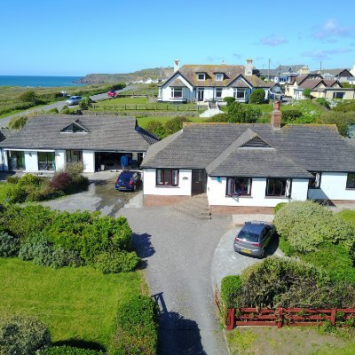 We are a holiday let. A 3 bed bungalow and annex. Sleeps 10 in total. 2 mins walk from Widemouth Bay beach in Cornwall.