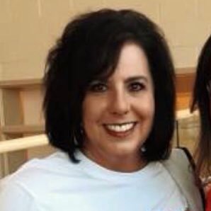 Christian, Proud Mother, Retired Educator, Cheer Coach, Yearbook Adviser