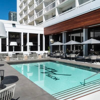 New Poolside Experience: Your Urban Oasis. Poolside Bites | Craft Cocktails Located @hotelartsyyc #PoolsideYYC