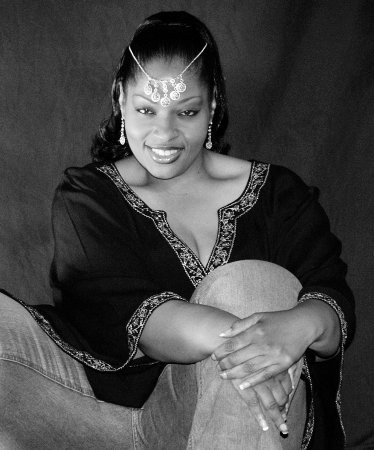 Full Figured Beauty that does plus size modeling in her spare time....Government worker and GREAT cook....