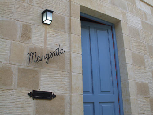 Margerita is located in the center of Xaghra, Gozo, Malta  just a few meters away from the church center and all the village amenities.