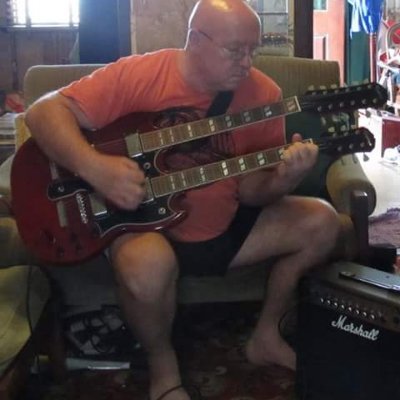 shit guitarist & multiple fired Rugby League coach