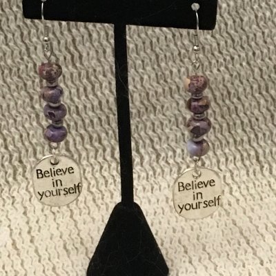 All of our earrings, bracelets, and necklaces are handmade in our shop. We are also excited to introduce our new hand made candle line!