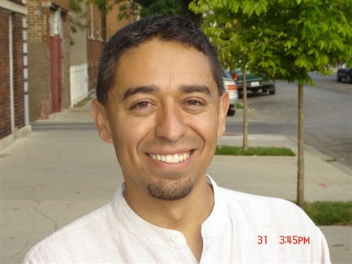 Chicano pastor in Chicago's Little Village community, husband and father of 7 kids, born in Mexico.