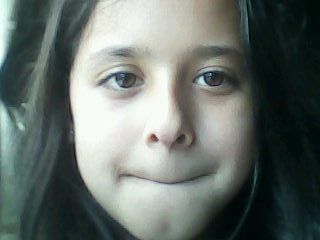 Sou uma fã de Justin Bieber que gosta de animais e defende a natureza.