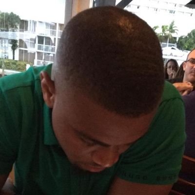 Gorgeous black man with the body of an action figure.