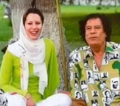 I'm Aisha Muammar Al-Gaddafi, daughter of late Colonel Muammar Al-Gaddafi the former president/leader of Libya Republic and one time Libya Goodwill Ambassador