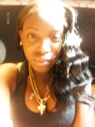 A pretty little woman. Living in this big ugly world, but im doing my thing!