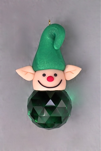 Steve is an artist who creates unique handmade ornaments incorporating swarovski crystal, natural items, vintage jewelry findings + other worldly sourced items