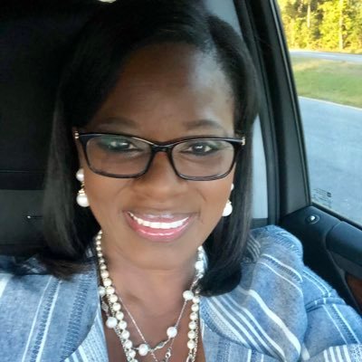 Servant; Lover of Books; Advocate for students; faith-filled; loving wife and mother; Passionate Educator