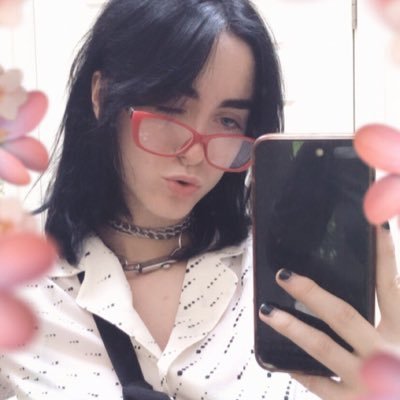 gothrancher's profile picture. it’s a doggy dog world // she/they