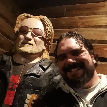 | song-author | professional cannabist | ...that's me standing next to a wooden statue of Daryl Hall