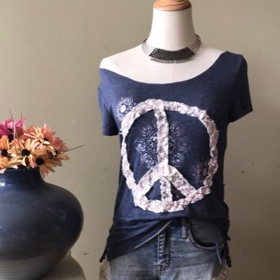 Detroit based designer of upcycled, handmade, OOAK Eco clothing, jewelry and travel accessories