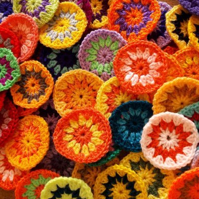 Brighten up your home or put a smile on someones face with a unique Phoenix Smiles colorful crochet blanket