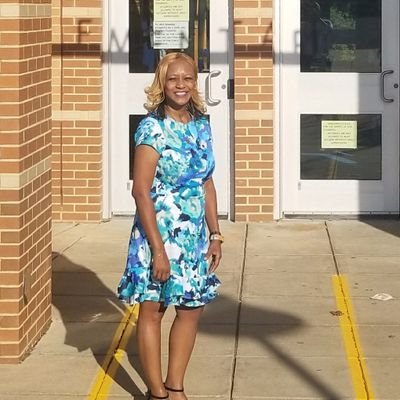 New Town Elementary principal  who believes in success for all children.