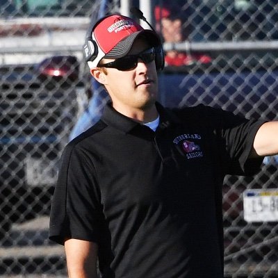 Teacher and head football coach of the Perkins County Plainsmen.