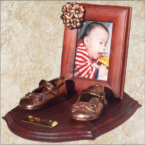 antique bronze baby shoes