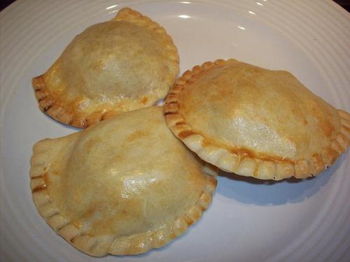TRY OUR MOUTH SAVORING EMPANADAS.THE RECIPE COMES FROM PERU.THESE ARE BAKED, WHICH IS DIFFERENT FROM OTHERS THAT ARE FRIED. WE HAVE BEEF,CHICKEN,POTATO,SPINACH