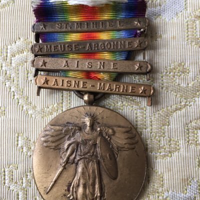 Catholic. Profile. Image is of Grandfather’s WWI Marine medal and battles. Proud of him and his belief in the fundamental values of America.