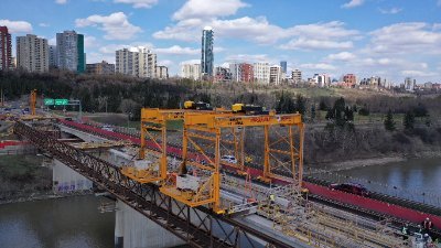 Traffic and project updates for Groat Road Bridge and area. Project completion anticipated for fall 2020. Tweets by Adriana, Jim & other @cityofedmonton staff.