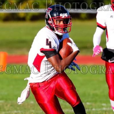 William E Tolman | Running back and corner |