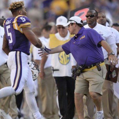 Tugged close to the best body the LSU sideline has ever seen. I have seen it all but will never tell...