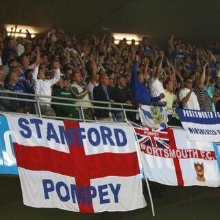 Pompey supporter home and away.