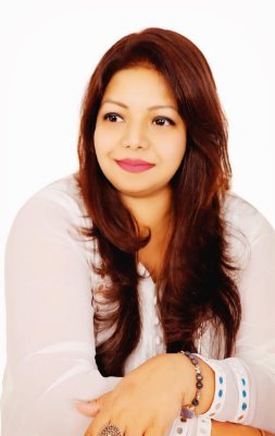 I am Moumita Kohli, an International speaker, a Happiness coach and a spiritual healer.