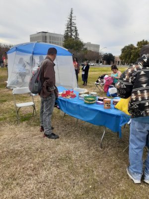 Creating opportunities for my community serving hot meals and in ear to those in need in my community