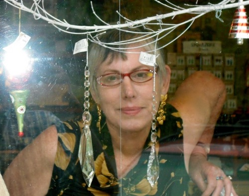 Retired nurse anesthetist living on a farm with peacocks, writing poetry, in love, happy.