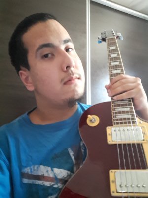 Me gusta tocar guitarra y sueño con formar parte de una banda rock