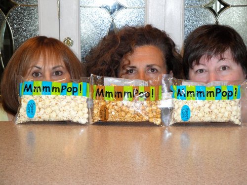 MmmmPop! is a delicious, high-quality popcorn snack that comes in four flavors: Sweet Corn, White Cheddar, Caramel Corn and Kickin' Key Lime.