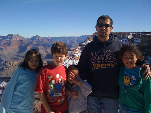 Son of God, husband, father, son, sibling, educator, Lakers fan