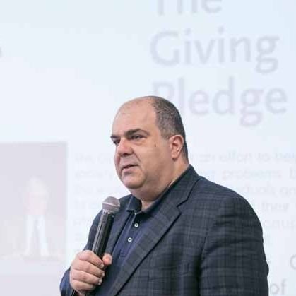 philanthropic, born Athens Greece ,Alma mater Cass business school London school of economics